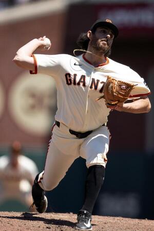 San Francisco Giants pitcher Ryan Walker (74) delivers a pitch against the Los Angeles Dodgers during the seventh inning at Oracle Park. editorial_image