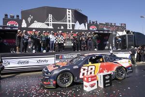 NASCAR Cup Series driver Shane van Gisbergen (88) celebrates with his team after winning the NASCAR Toyota / Save Mart 350 at Sonoma Raceway. editorial_image