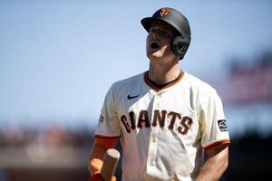 San Francisco Giants third baseman Matt Chapman (26) reacts to striking out against the Los Angeles Dodgers during the 11th inning at Oracle Park. editorial_image