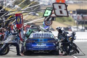 The pit crew for NASCAR Cup Series driver Kyle Busch (8) work on the vehicle at Sonoma Raceway. editorial_image