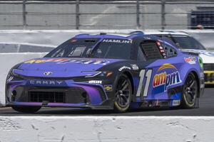 NASCAR Cup Series driver Denny Hamlin (11) navigates around Turn 11 at Sonoma Raceway. editorial_image