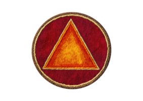 Cloth patch mockup with triangular warning symbol in red and yellow embroidery isolated on a transparent background png