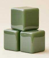 Cube shapes arranged in a stacked formation showcasing smooth surfaces and soft green color under neutral lighting, allowing for focus on geometric simplicity and design elegance photo