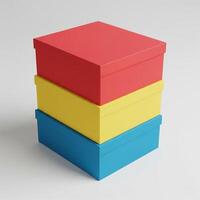 Three colorful boxes stacked on top of each other photo