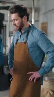 Multinational African American Caucasian men talking work coffee factory workers analyzing roasting checklist review bean beans espresso machinery grind process industrial expertise caffeine teamwork video