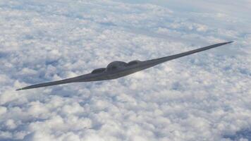 A stealth fighter flying through the clouds photo