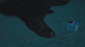 Close-Up of Shoe and Ticket in Blue Light video