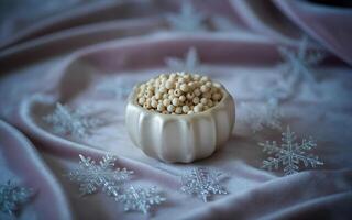 A bowl of rice sitting on a pink cloth photo