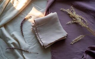 A purple and white cloth with flowers on it photo