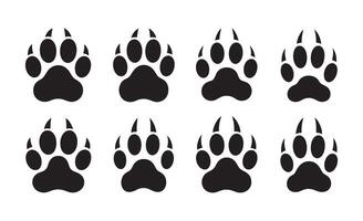 Collection of eight black paw prints on a white background vector