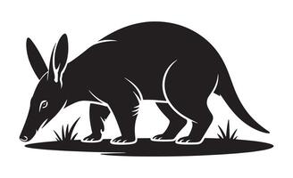 Stylized black silhouette of an aardvark foraging in grass vector