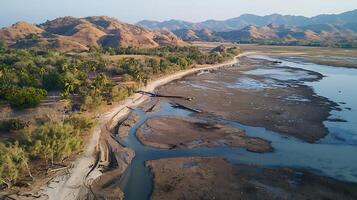 Scenic Tropical Coastline with Rolling Hills and Low Tide Waterscape. photo