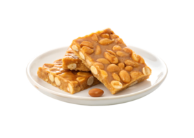 Peanut brittle served on a plate isolated on transparent background png