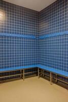 indoor swimming pool amenities changing area perspective geometric pattern of tiles in a vacant changing area photo