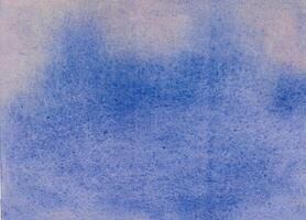 Gradient handmade watercolor background from sky blue to deep indigo photo