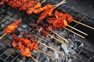 Chicken skewers on a grill photo