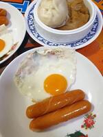 A table with a plate of food and a plate of food photo