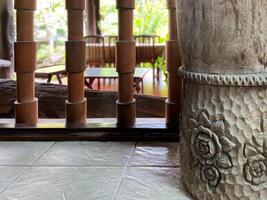 A large wooden pillar photo