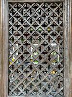 A wooden frame with a window photo
