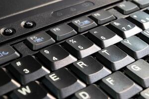 A close up of a keyboard on a laptop computer photo