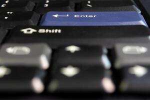 A close up of a keyboard with a shift key photo