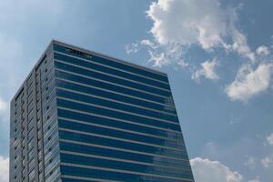 A tall building with a clock on it photo