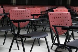 A row of chairs in a classroom photo