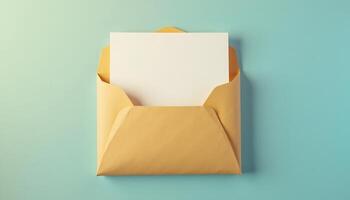 Open Envelope with Blank Card on Light Blue Background Top View photo