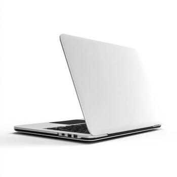 A white laptop computer on a white surface photo