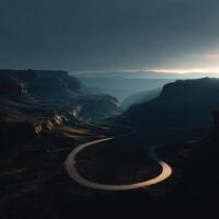 A winding road in the middle of a canyon photo