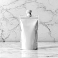 A whites plastic pouch sitting on a marble counter photo