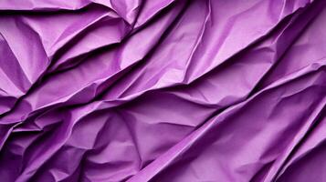 Crumpled purple wrapping paper forms abstract background texture photo