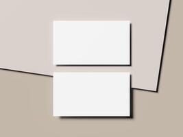 Two white business cards mockup with layered geometric beige background photo