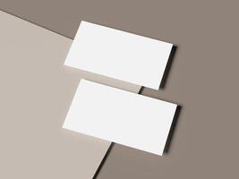 Floating white business cards on overlapping beige paper background photo