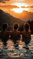 Friends Enjoying a Sunset Poolside Gathering in the Mountains During Summer. photo