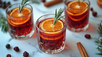 Holiday cocktail with orange and rosemary photo