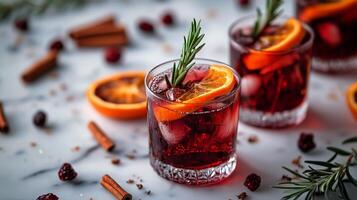 Cranberry cocktail in glass with orange photo