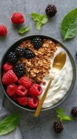 Yogurt bowl with fruits and granola photo
