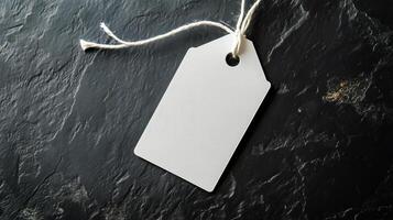 Blank Tag Resting on Dark Stone Surface With Natural Texture and Warm Lighting photo
