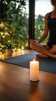 Yoga Practice With Candlelight and Plants in Peaceful Indoor Setting During Evening Hours photo