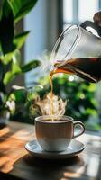 Brewing Coffee in a Cozy Cafe With Warm Lighting and Green Plants in the Background During Morning Hours photo
