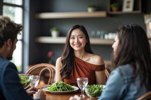 Three People Dining with Salad Bowls photo