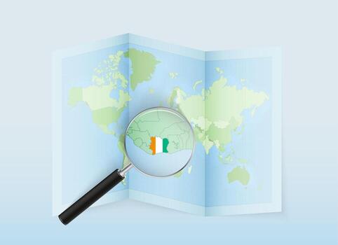 A folded world map with a magnifying lens pointing towards Ivory Coast. Map and flag of Italy in loupe. vector