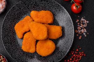 Chicken nuggets, meat takeaway meal with salt. Chicken nuggets, fast food photo