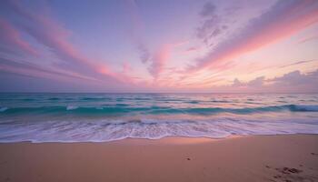 A beautiful sunset over the ocean and beach photo