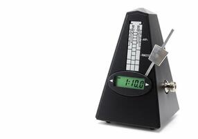 A black and white clock with a digital display photo