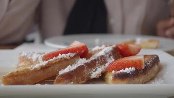 French toast with strawberries and powdered sugar video