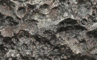 Cratered Surface Texture Resembling Lunar or Planetary Terrain photo