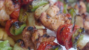 Delicious grilled chicken skewers with colorful vegetables video