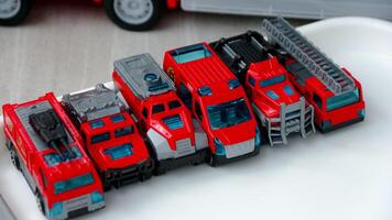 Toy Firetrucks in a Row, Red Emergency Vehicle Collection photo
